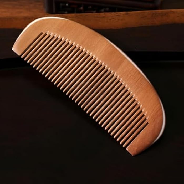 A luxurious wooden comb for styling and combing hair, whether wet or dry, helps to distribute natural oils to give the hair a healthy, smooth and tangle-free appearance daily - Image 3